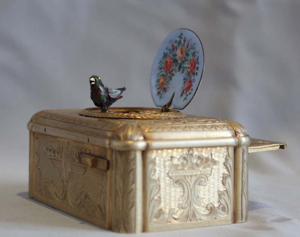 Antique singing bird box silver gilt and enamel by Bontems of Paris.
