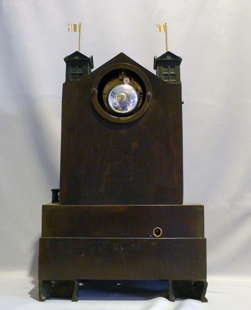 Antique French automaton striking mantel clock with moving water and waterwheel.