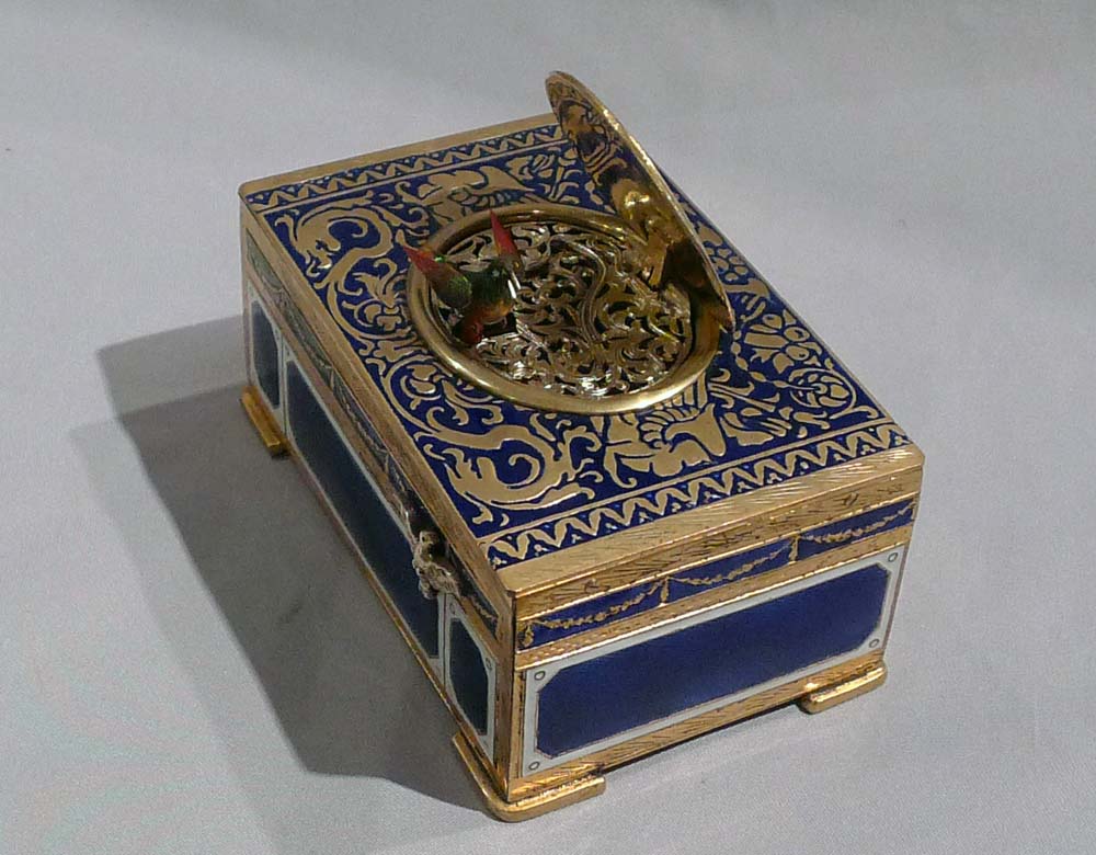 Singing bird box automaton in gilt bronze and enamel.