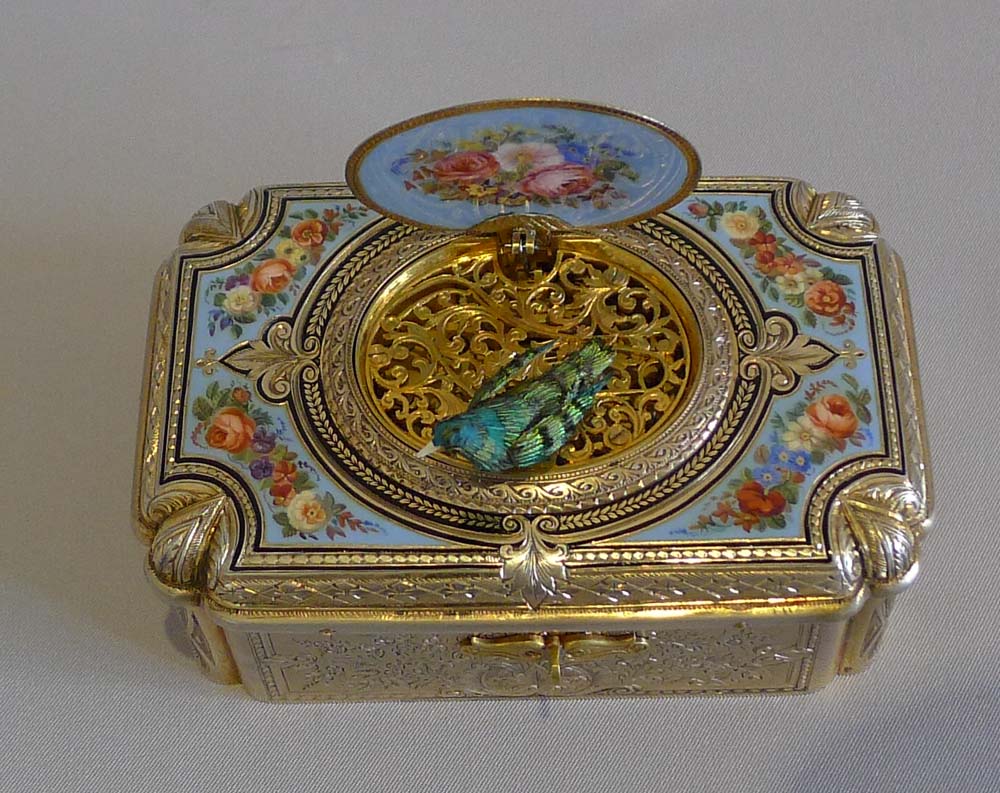 Antique Bruguier fusee singing bird box in silver gilt and enamel.