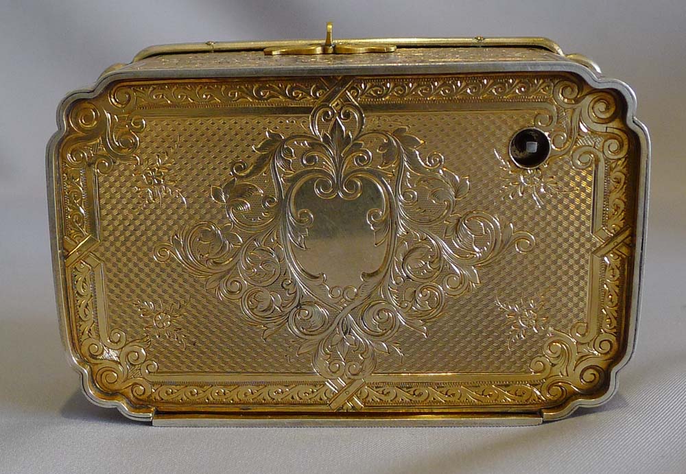 Antique Bruguier fusee singing bird box in silver gilt and enamel.