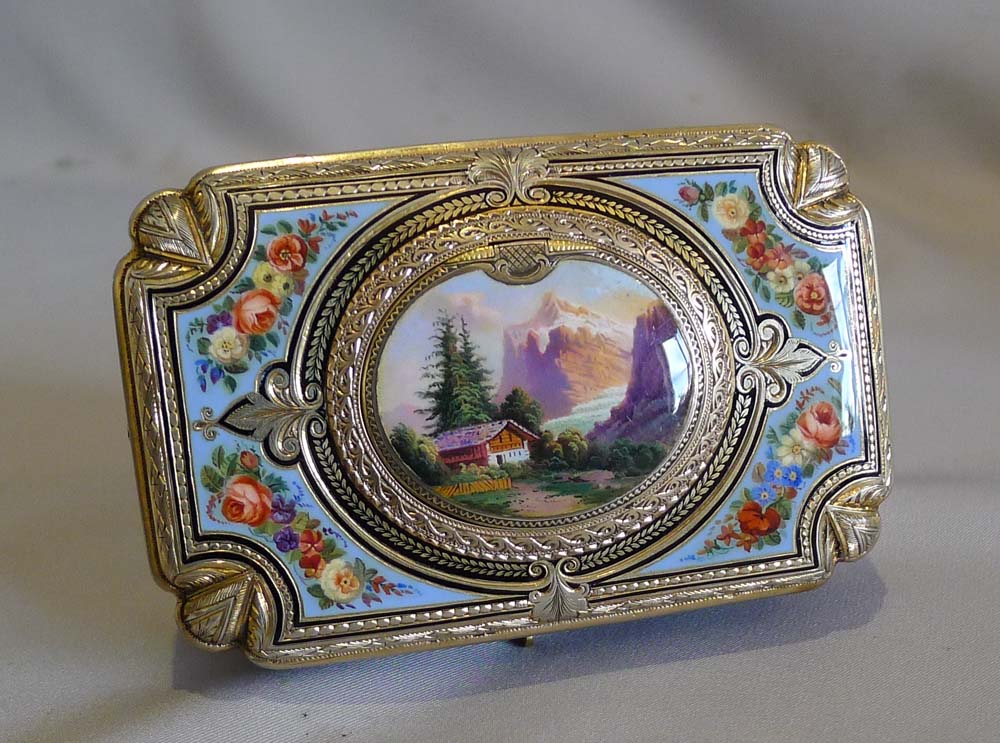 Antique Bruguier fusee singing bird box in silver gilt and enamel.