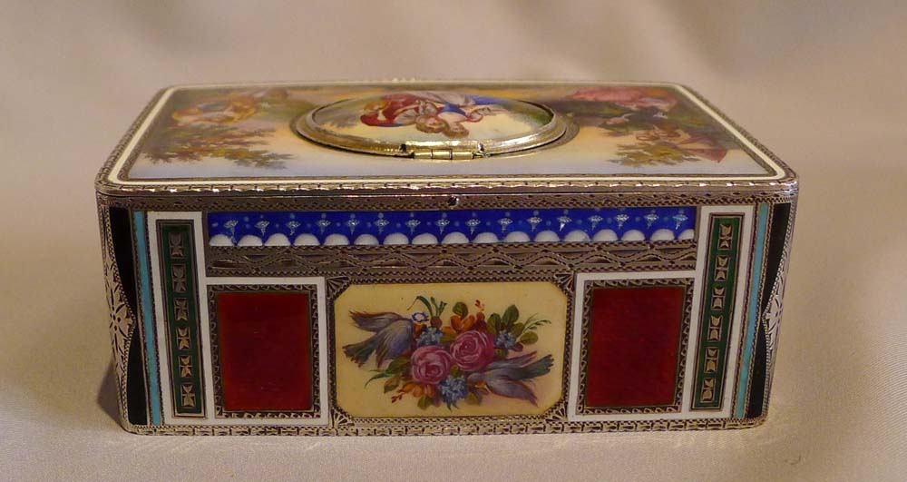 Singing bird box in silver and hand painted enamel by Griesbaum in fitted leather case.