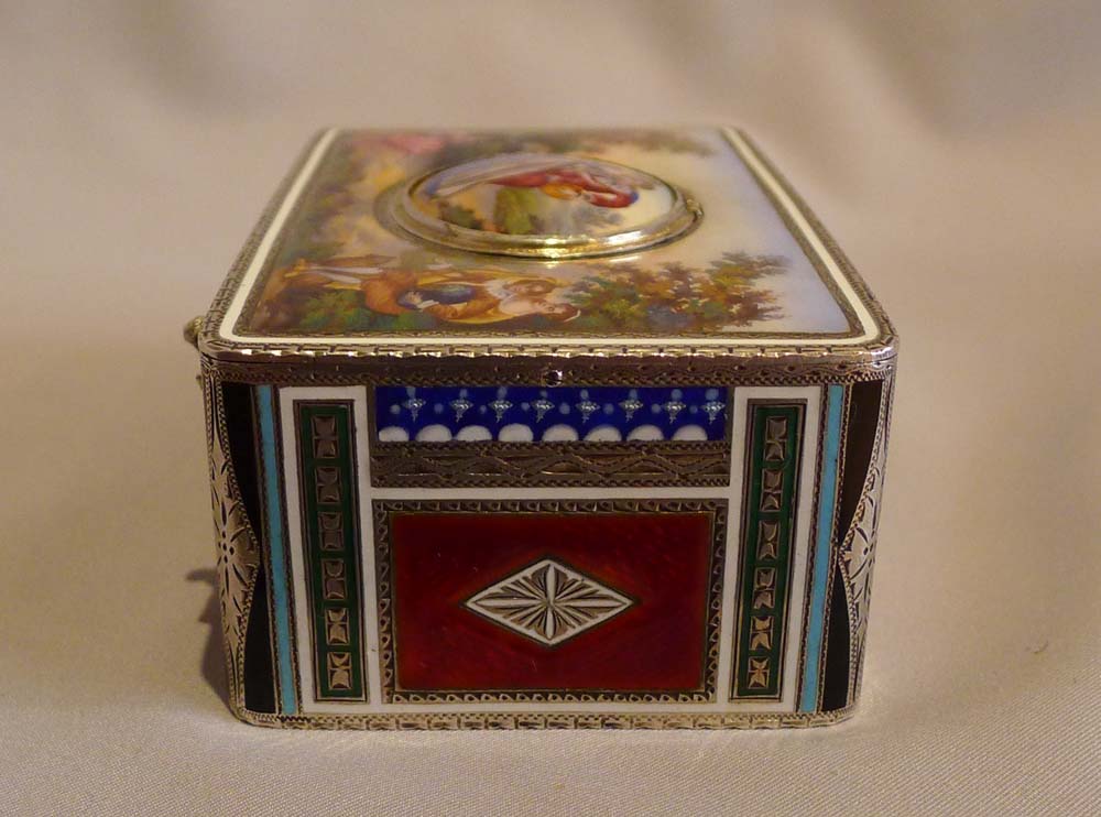 Singing bird box in silver and hand painted enamel by Griesbaum in fitted leather case.