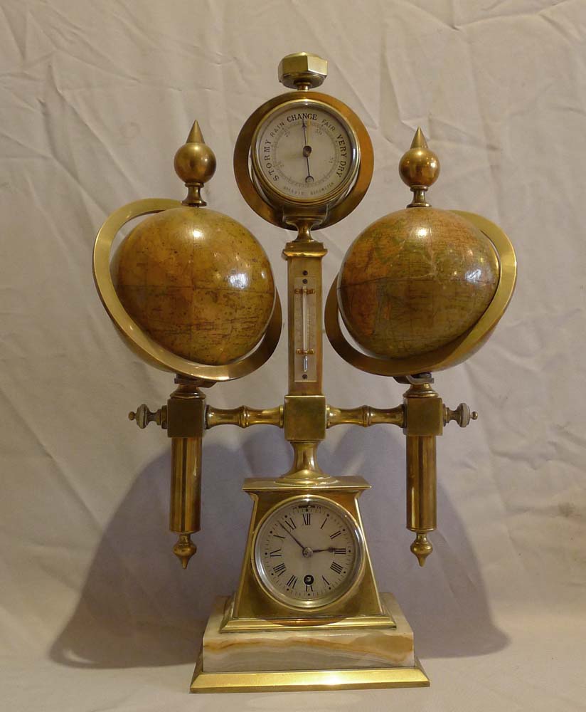 Desk compendium with two rotating terrestrial & celestial globes, thermometer, barometer & compass