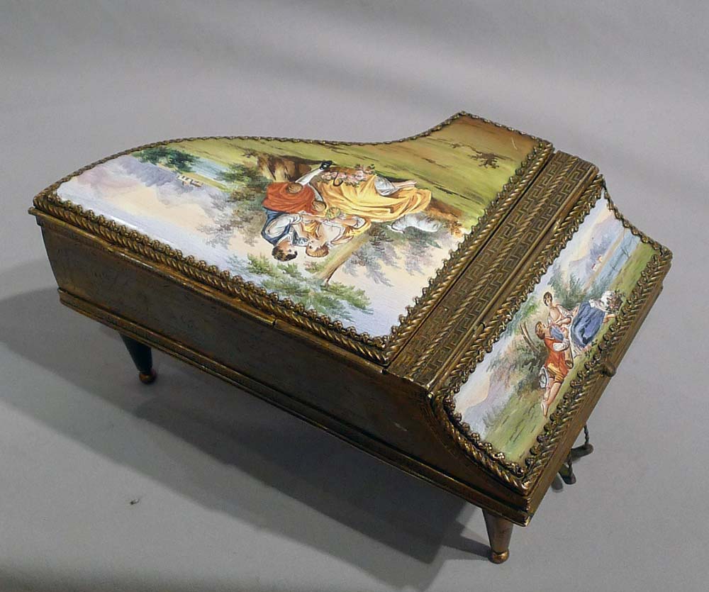 Fine musical enamel and gilt bronze piano.