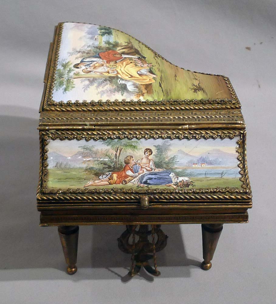 Fine musical enamel and gilt bronze piano.
