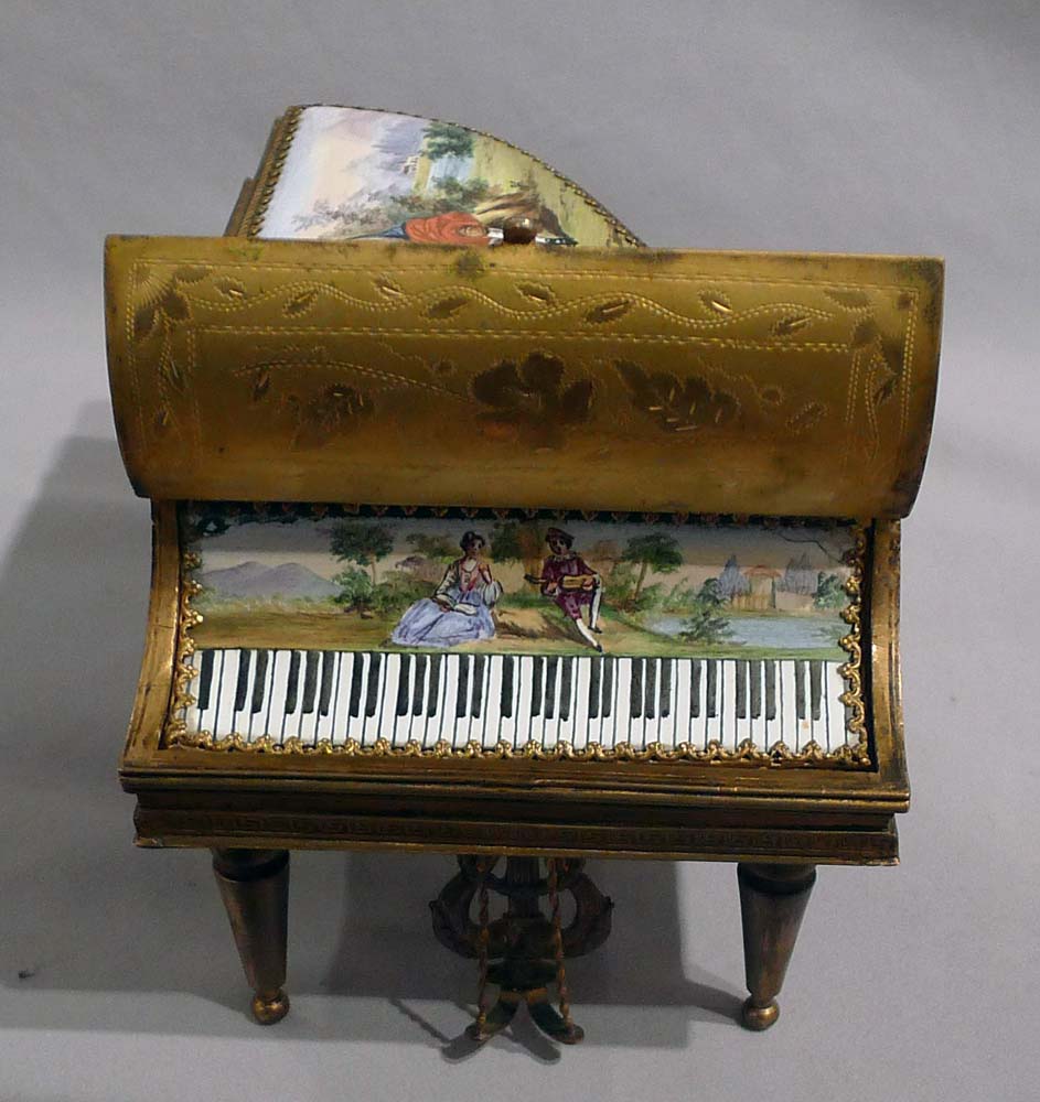 Fine musical enamel and gilt bronze piano.