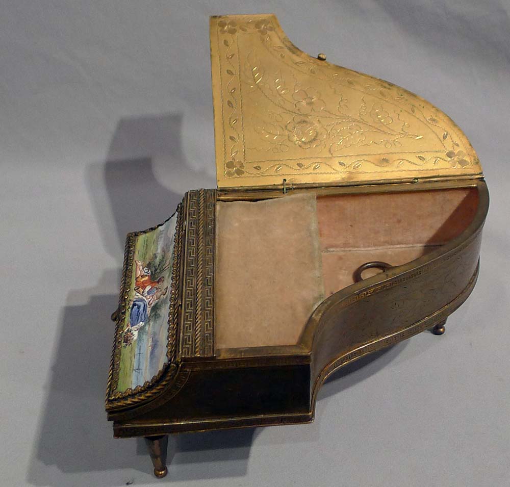 Fine musical enamel and gilt bronze piano.