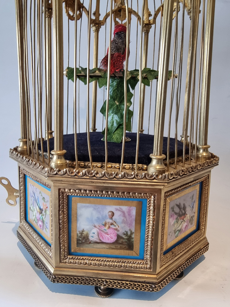 A Stunning Hexagonal Sevres Plague Singing bird Cage by Bontems