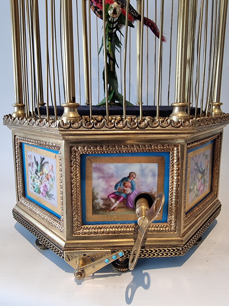 A Stunning Hexagonal Sevres Plague Singing bird Cage by Bontems