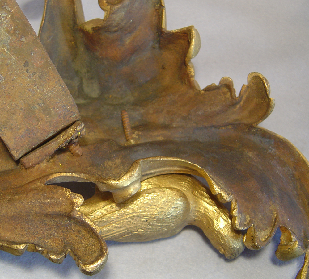 Pair 18th century Louis XVth ormolu chenets with parrots.