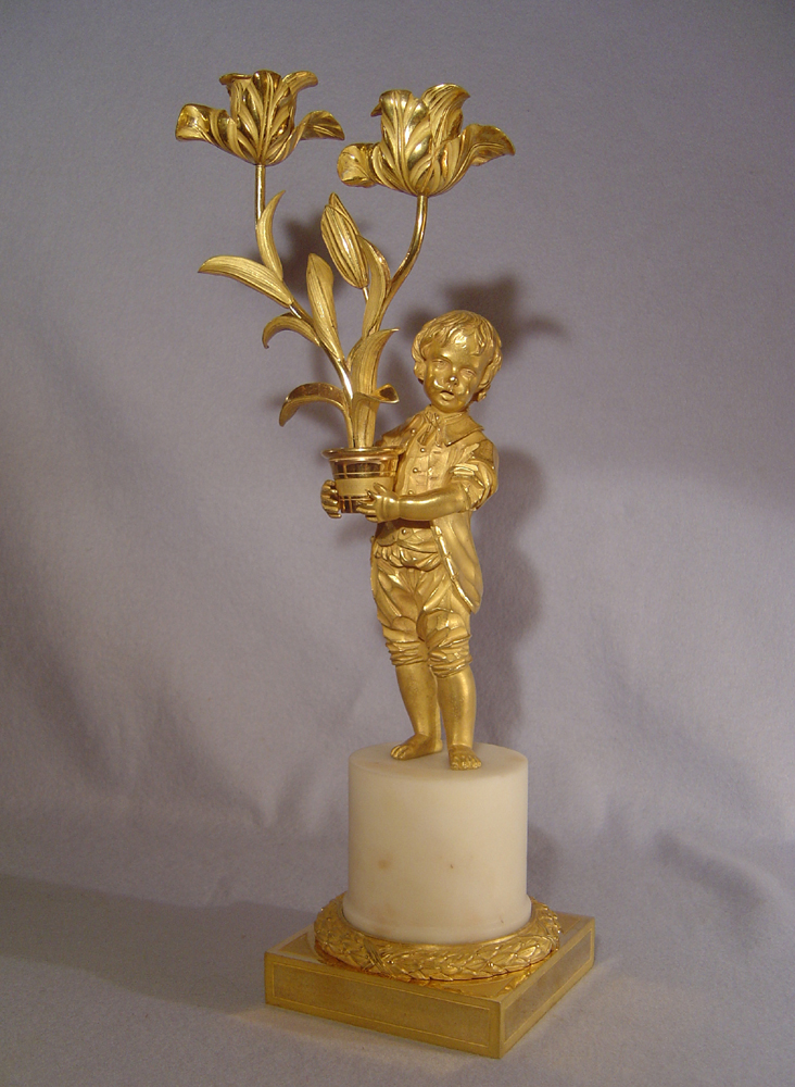 Pair Louis XVIth transitional ormolu and white marble figural candelabra