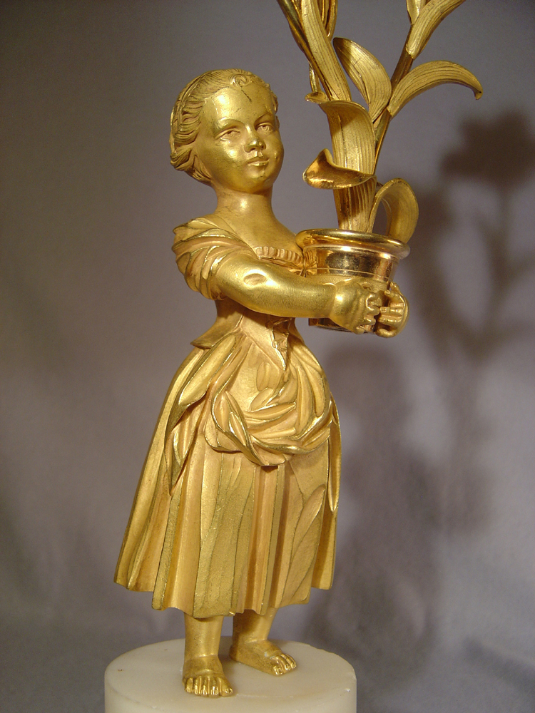Pair Louis XVIth transitional ormolu and white marble figural candelabra