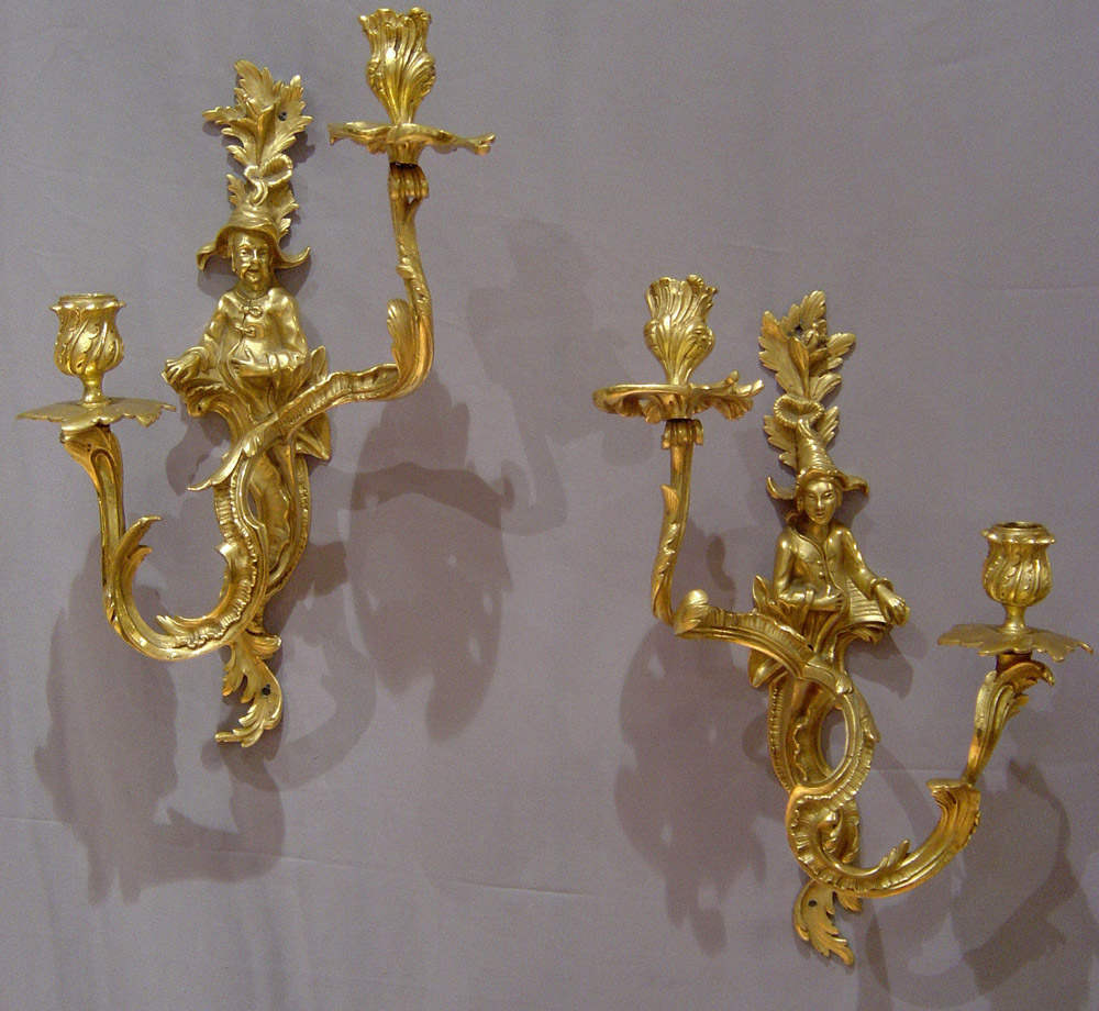 Pair Louis XV transitional ormolu chinnoiserie wall lights.