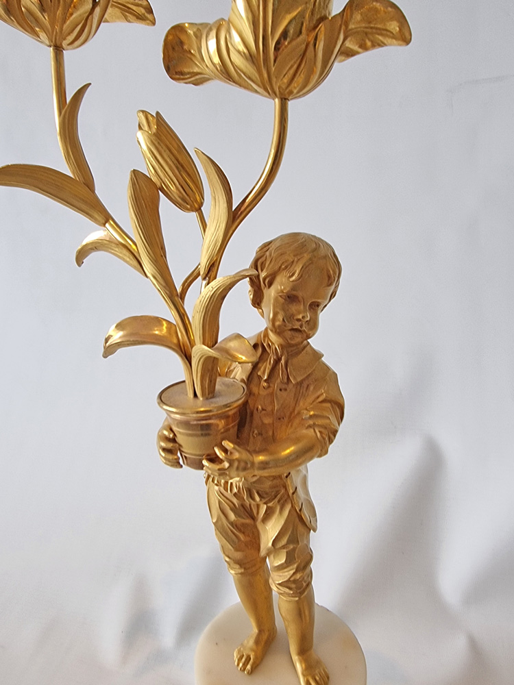 Pair Louis XVIth transitional ormolu and white marble figural candelabra