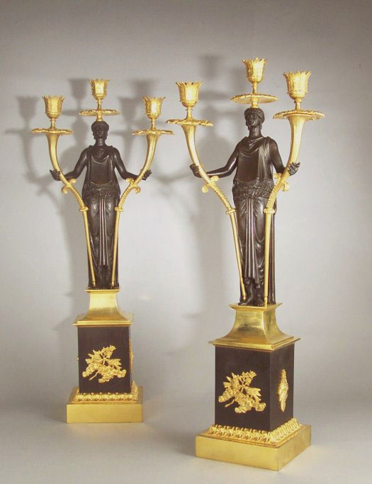 Antique Pair of Baltic or Russian patinated bronze and ormolu figural candelabra.