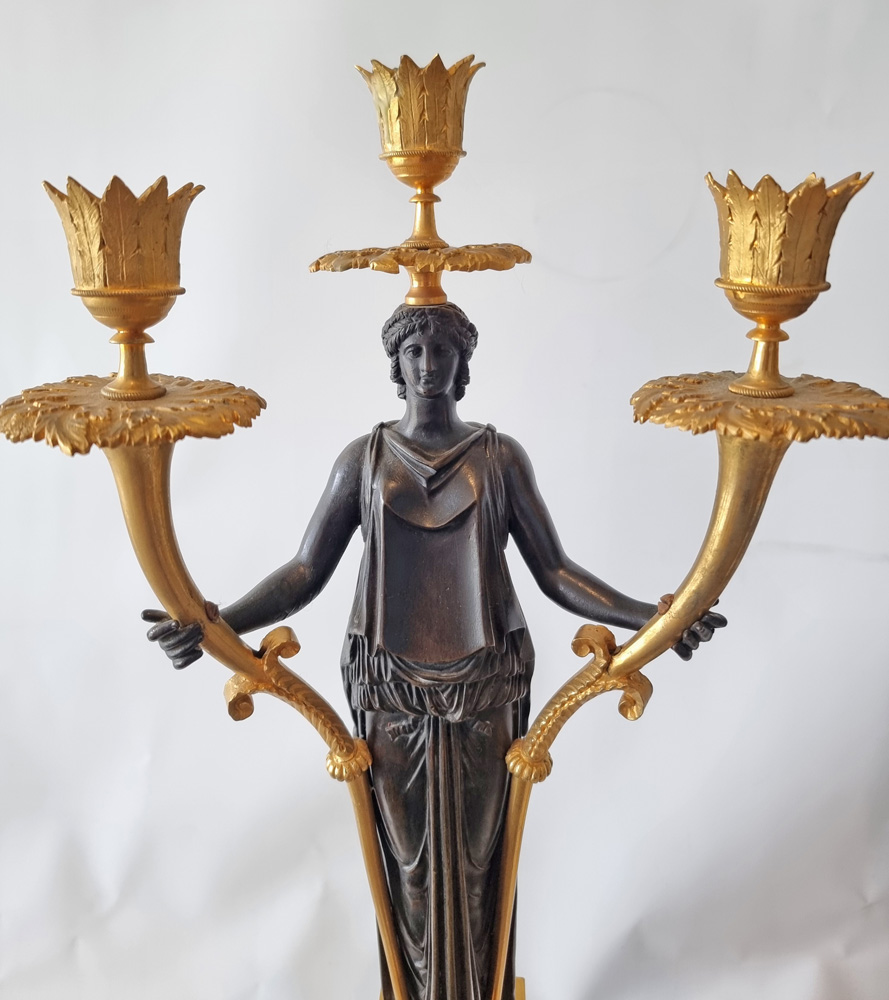 Antique Pair of Baltic or Russian patinated bronze and ormolu figural candelabra.