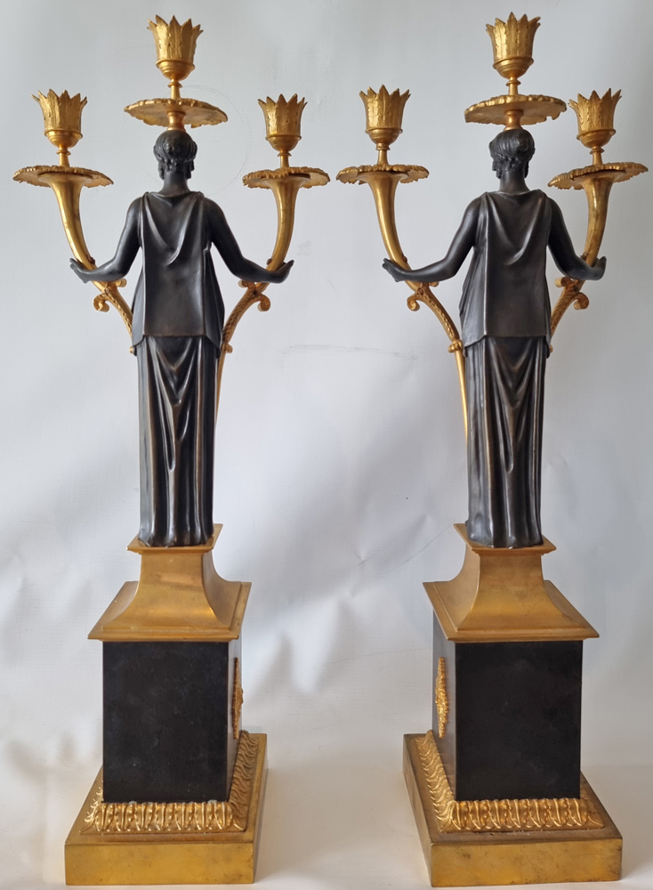 Antique Pair of Baltic or Russian patinated bronze and ormolu figural candelabra.