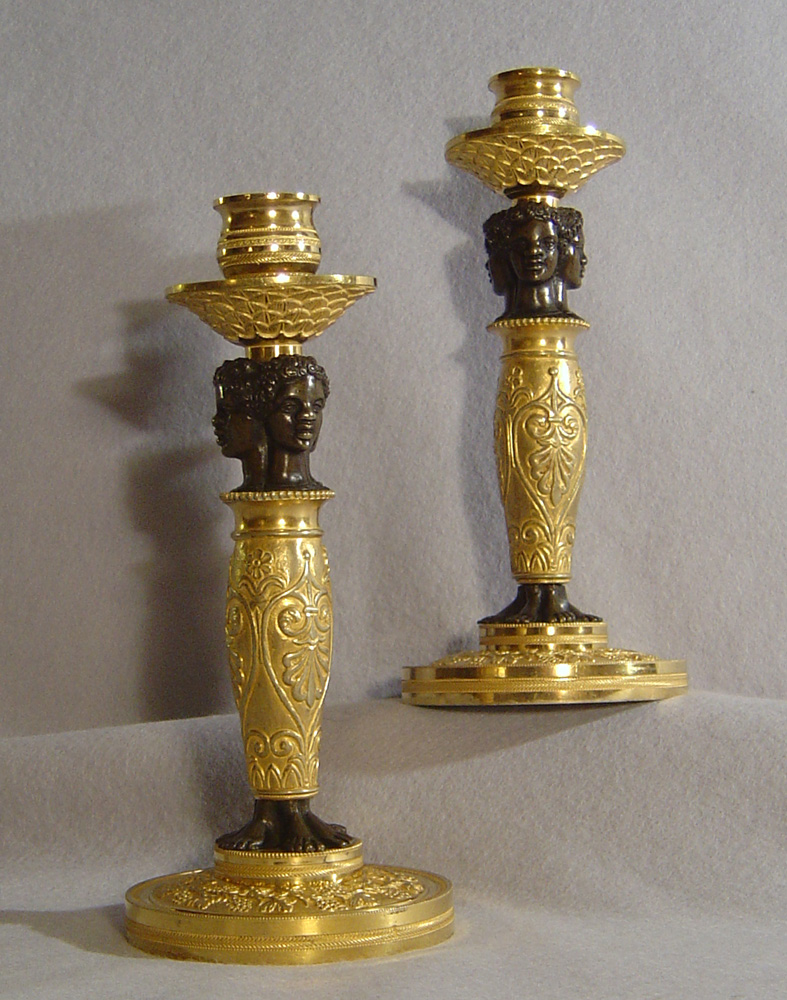 Pair of antique early 19th century blackamoor candlesticks.