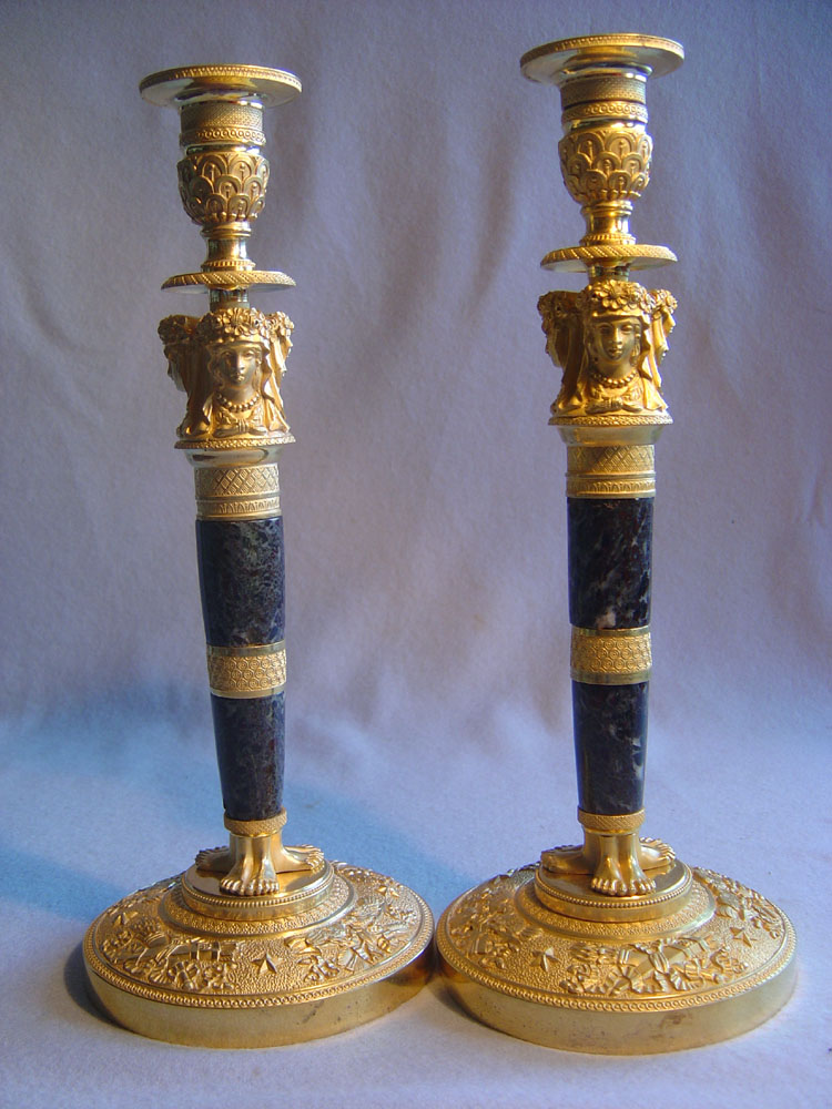 Antique French candlesticks of Empire period in ormolu and antique vert marble.