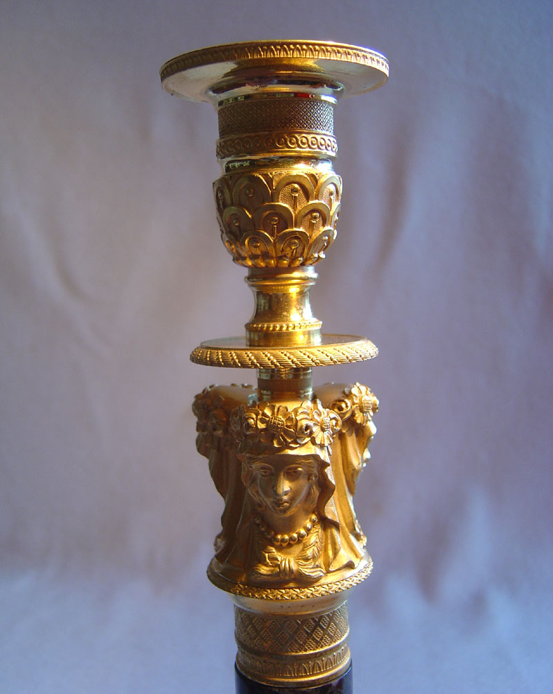 Antique French candlesticks of Empire period in ormolu and antique vert marble.