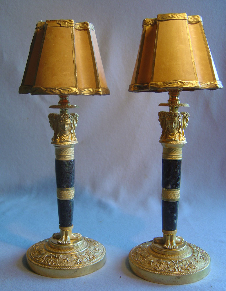 Antique French candlesticks of Empire period in ormolu and antique vert marble.