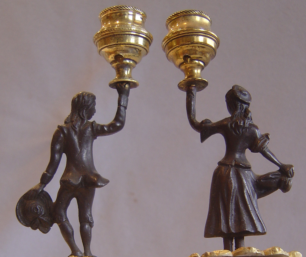 Pair of English Regency figural candlesticks.