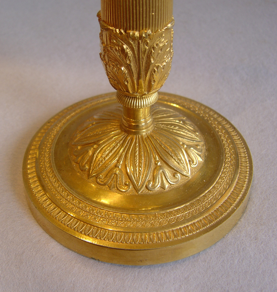 Antique French pair of ormolu candlesticks.