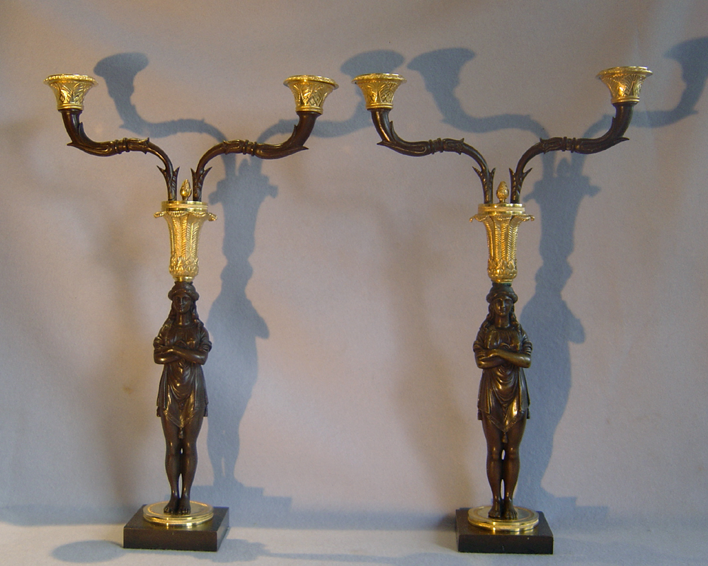 Unusual pair of Empire two branch candelabra in gout d'Egypt or Egyptian style
