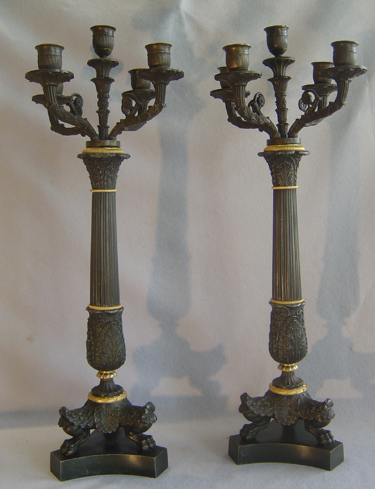 Antique candelabra from the French Charles X period in patinated bronze and ormolu.