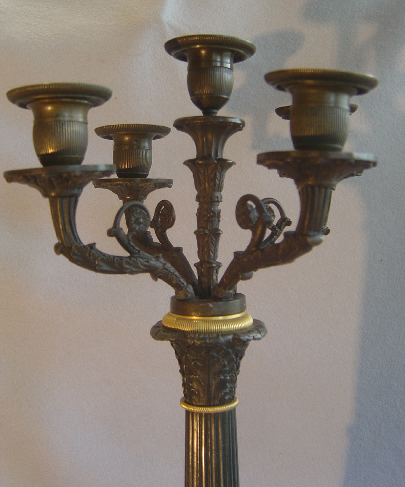 Antique candelabra from the French Charles X period in patinated bronze and ormolu.