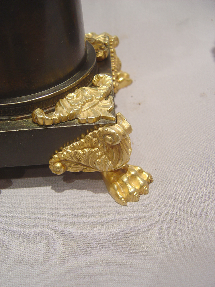 English Regency patinated bronze parcel gilt and ormolu urns.