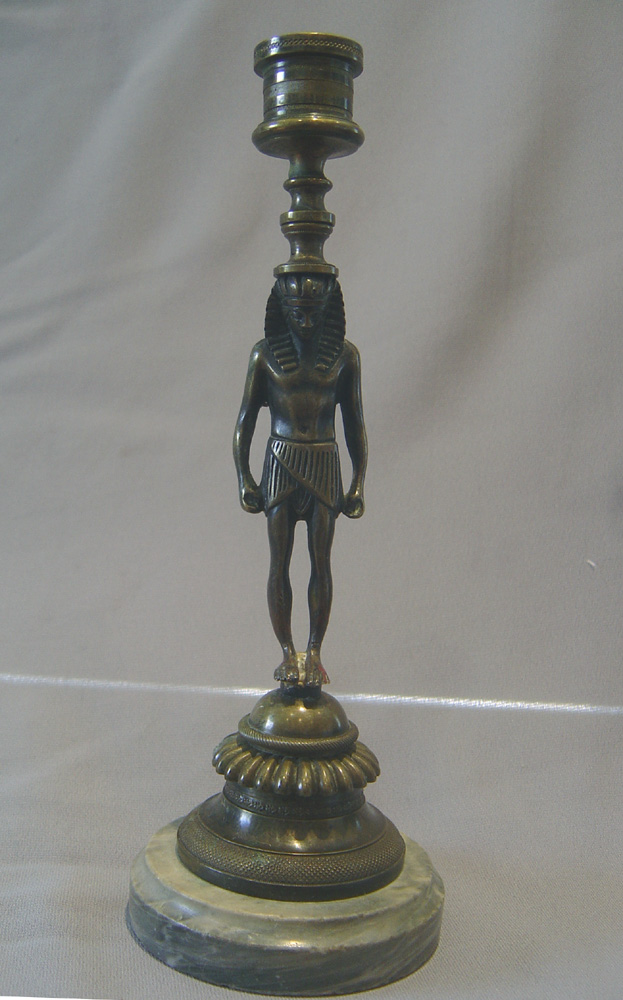 English Regency bronze candlestick in the goute d'Egypt.