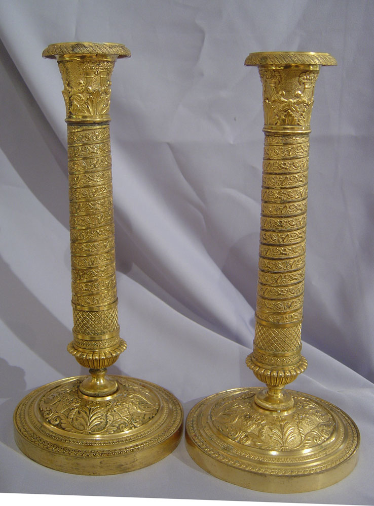 Antique candlesticks French Empire in ormolu .