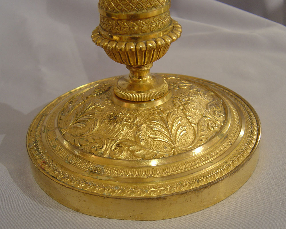 Antique candlesticks French Empire in ormolu .