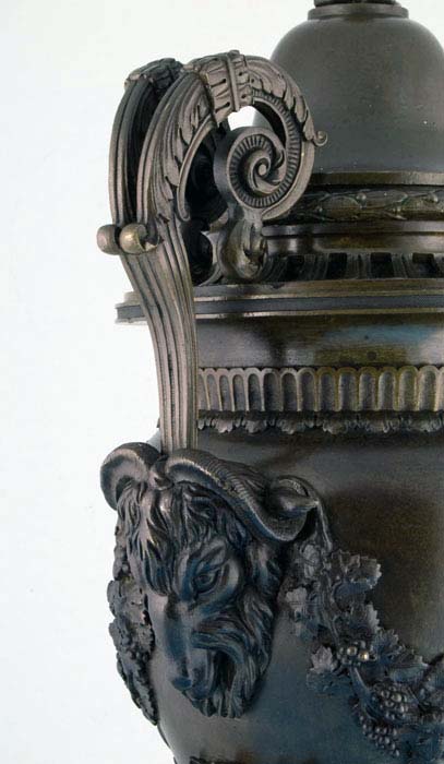 Large antique bronze lidded urn.