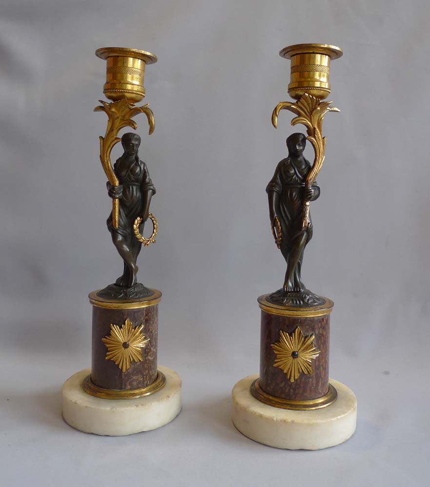 Pair English late 18th century marble, ormolu and patinated bronze figural candlesticks.