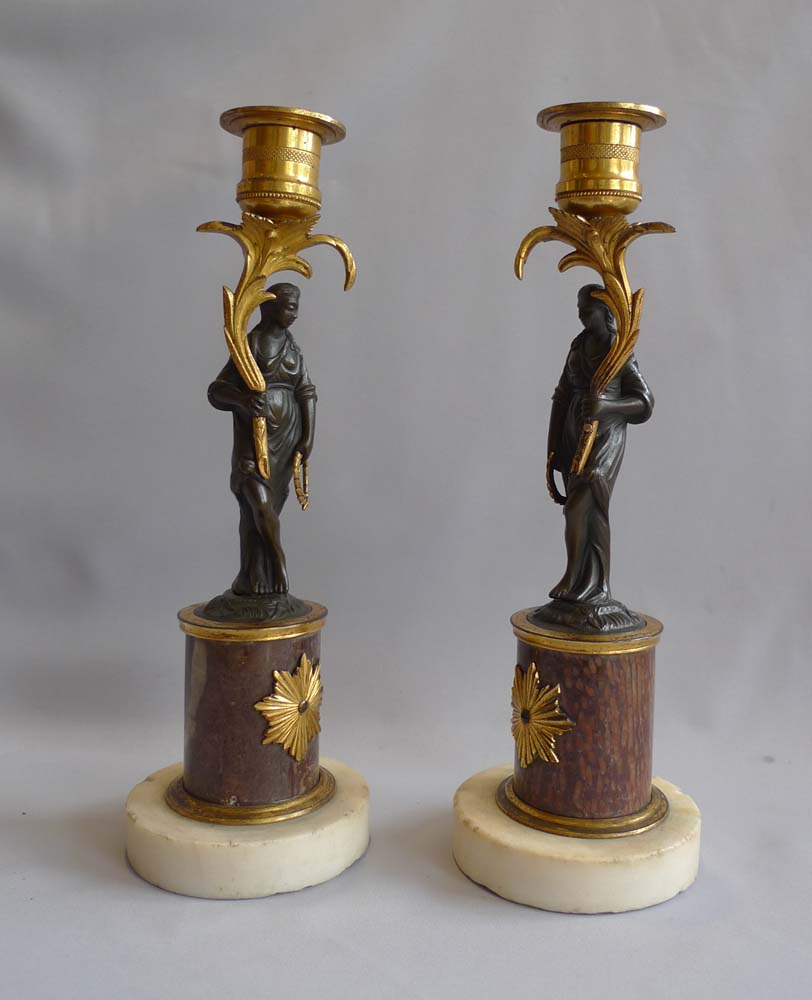 Pair English late 18th century marble, ormolu and patinated bronze figural candlesticks.