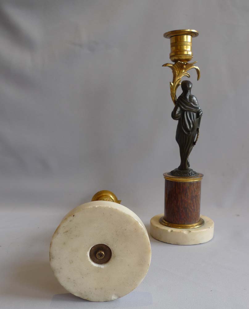 Pair English late 18th century marble, ormolu and patinated bronze figural candlesticks.