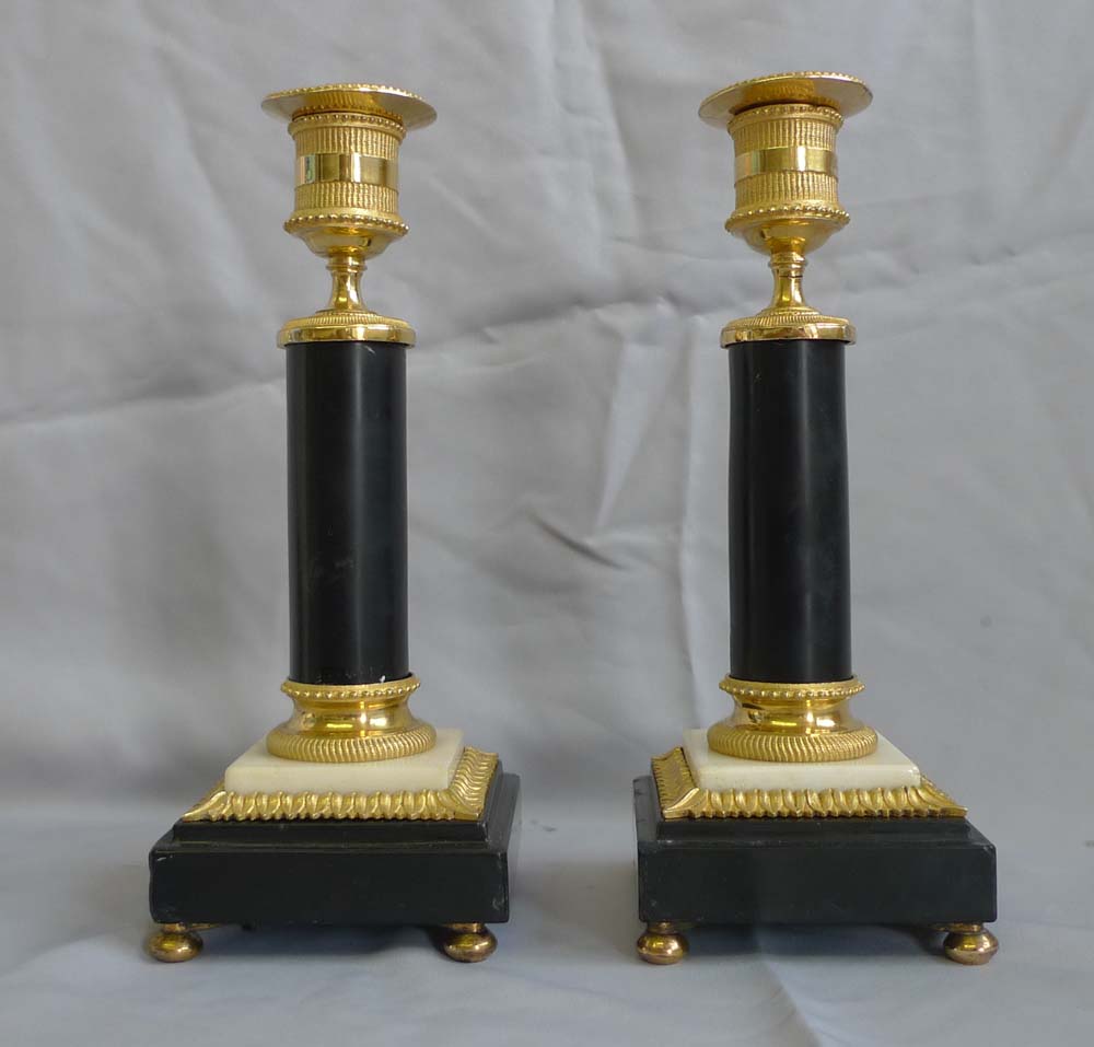 Pair candlesticks, English George III in ormolu and black and white marble, antique.