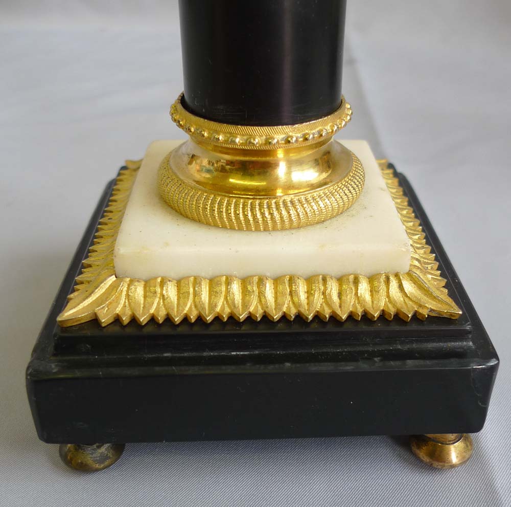 Pair candlesticks, English George III in ormolu and black and white marble, antique.