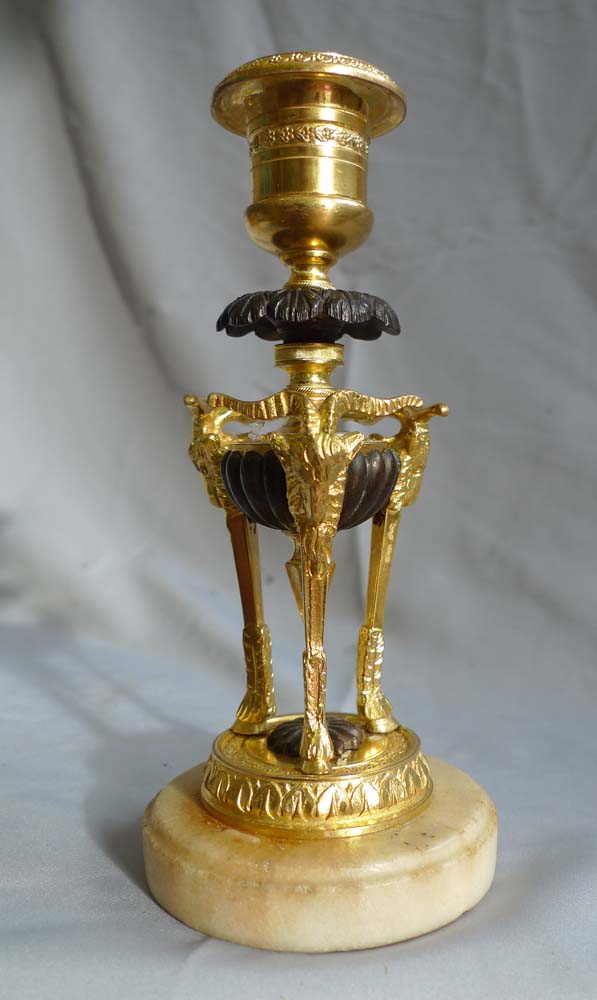 Pair antique candlesticks in ormolu, patinated bronze and marble.