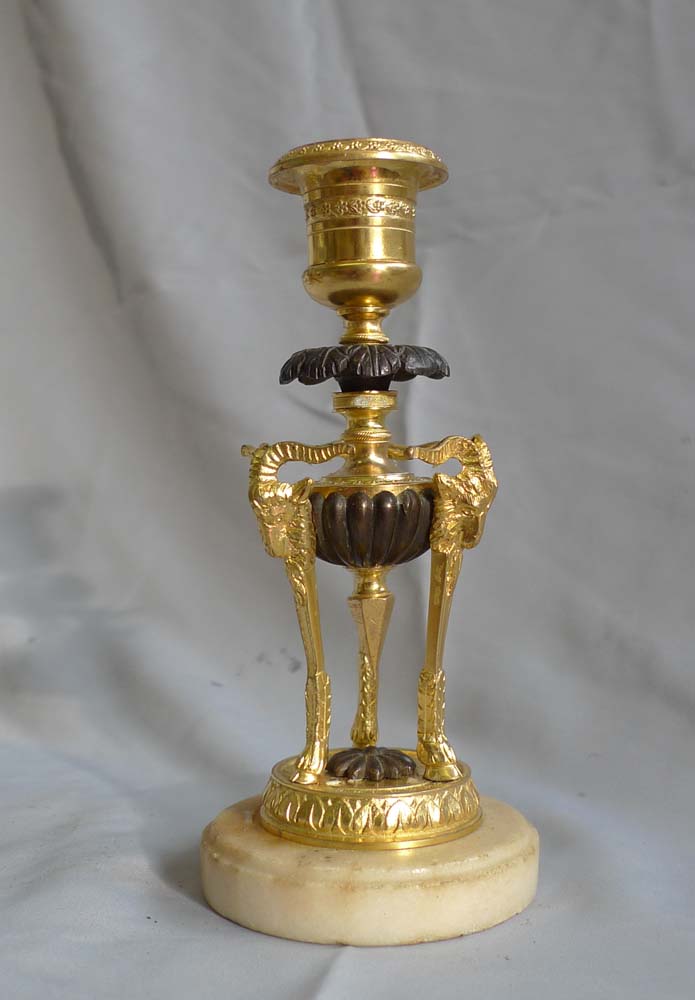 Pair antique candlesticks in ormolu, patinated bronze and marble.