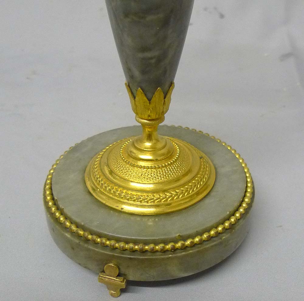Antique French Directoire candlesticks in ormolu and Bleu Tarquin marble.