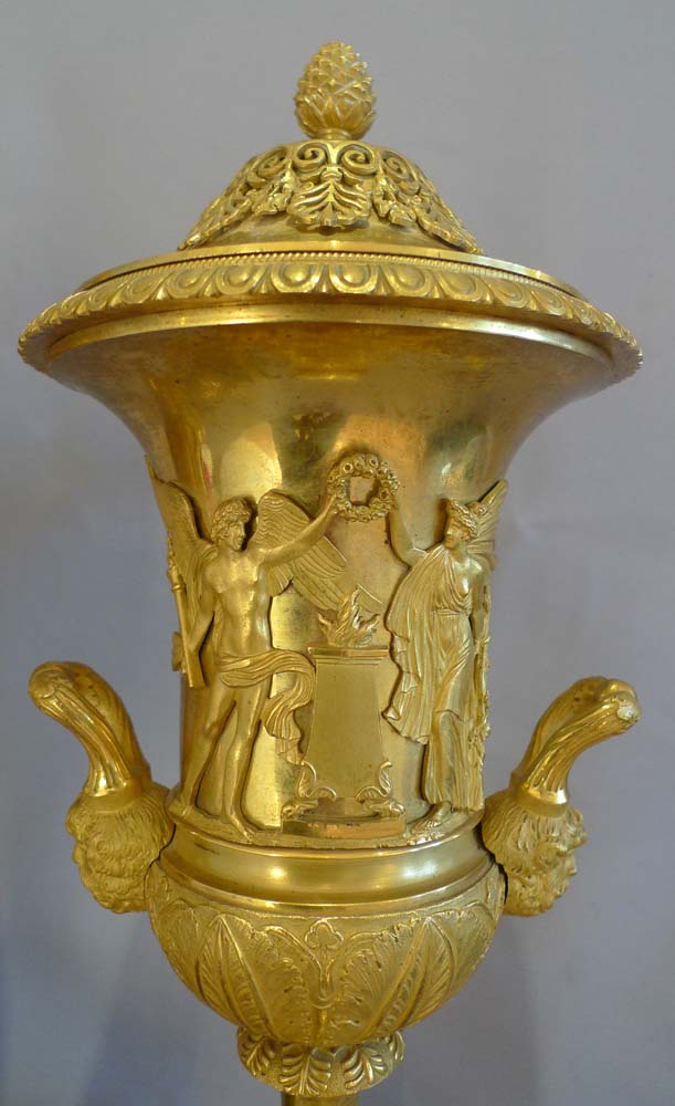 Antique true pair of neo-classical ormolu and rouge marble covered urns, probably Russian.