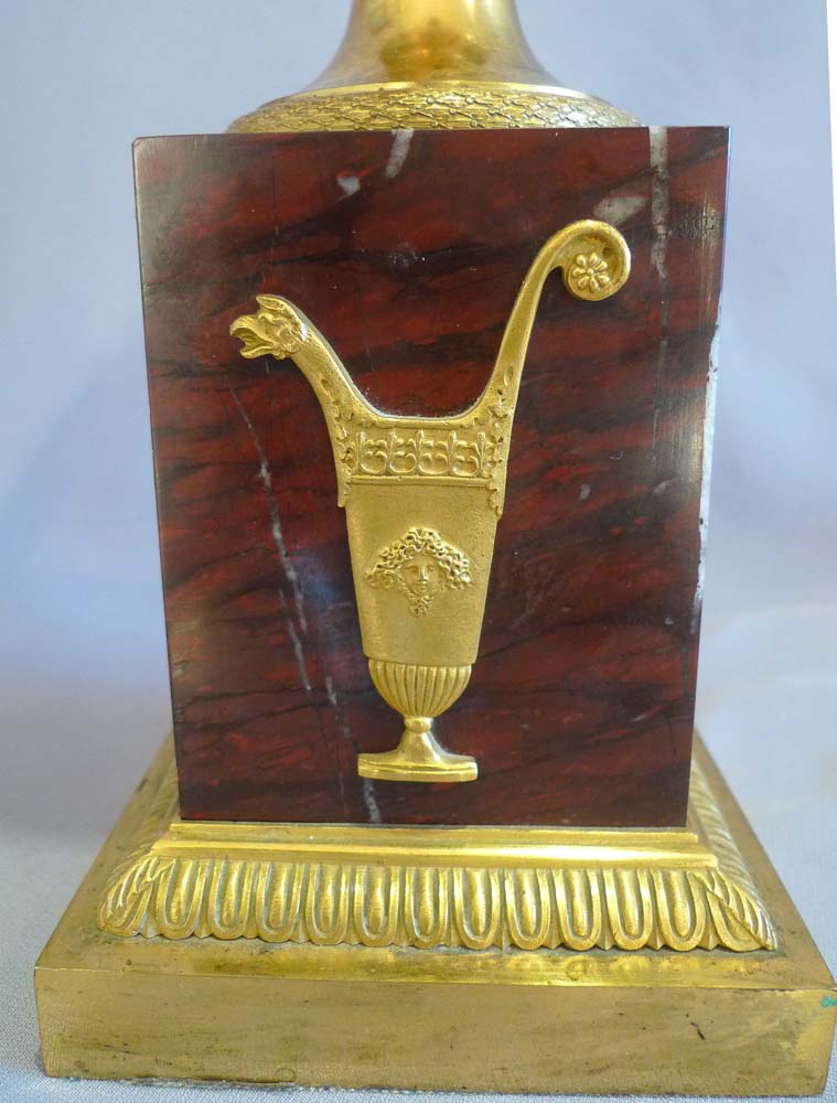 Antique true pair of neo-classical ormolu and rouge marble covered urns, probably Russian.