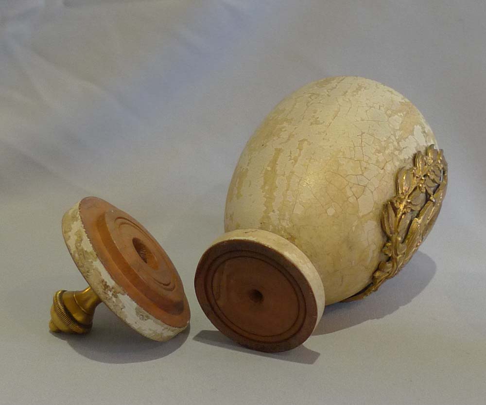Antique pair of turned and painted covered urns with fine ormolu mounts
