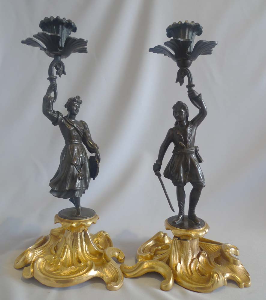 Antique pair Greek Revolution Hellenistic figural candlesticks with figure of hero.