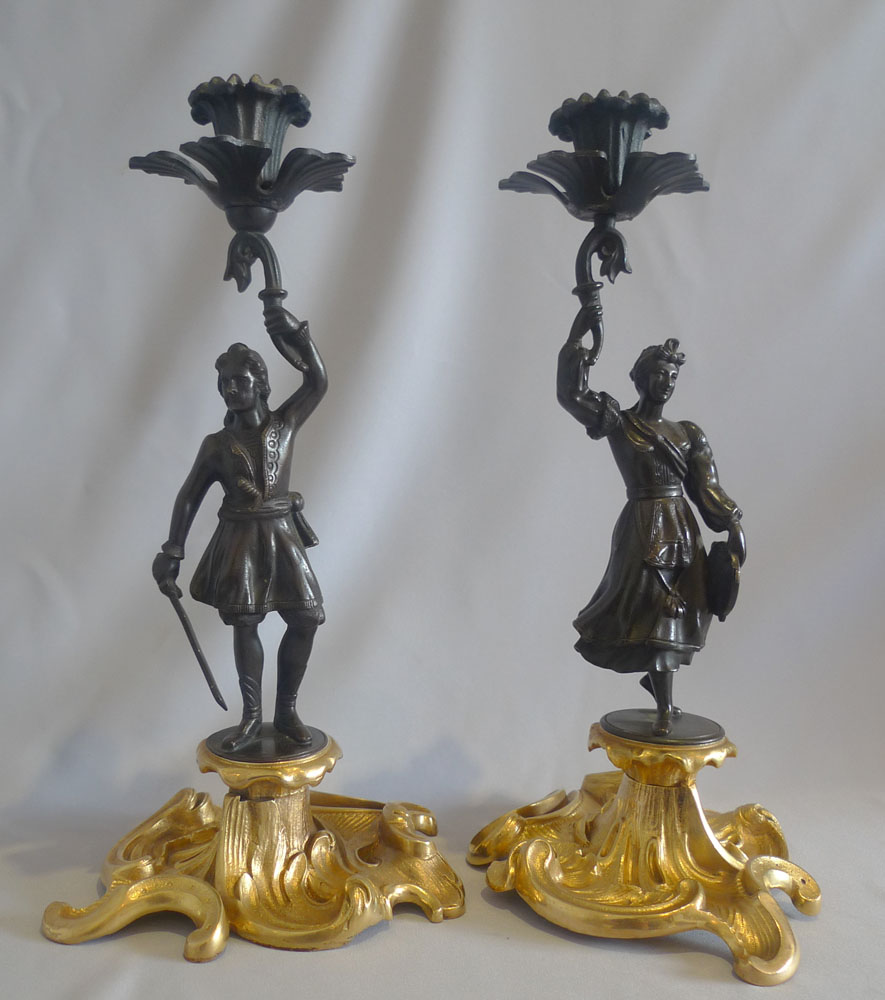 Antique pair Greek Revolution Hellenistic figural candlesticks with figure of hero.